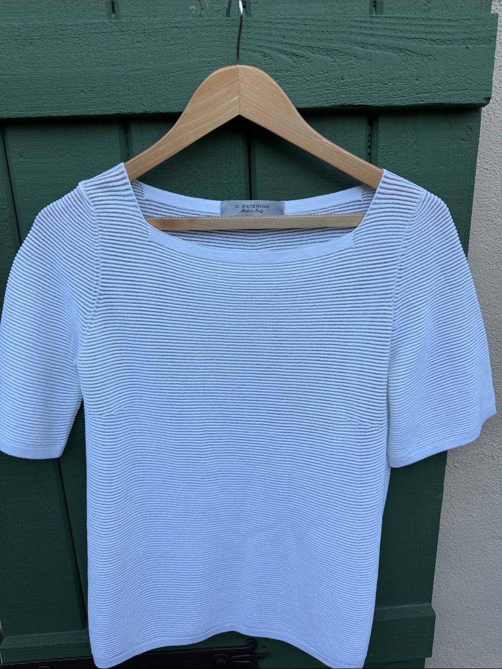 D. Exterior White Ribbed Short Sleeve Top